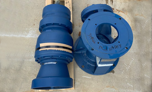 Pumps sitting on a pallet in a warehouse. Pumps sitting on a pallet in a warehouse.
