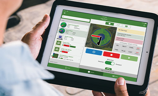 Irrigation system watering crops. Maintaining your crops on a smart device.